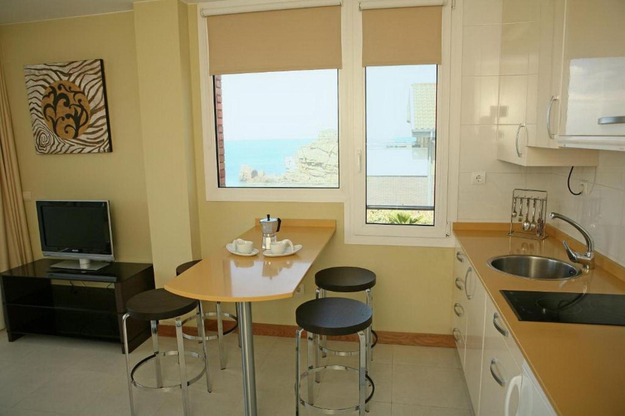 Apartamentos Playa De Portio 리엔크레스 외부 사진